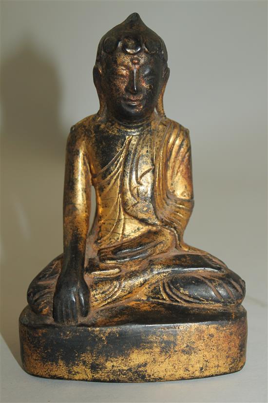 A Burmese gilt, composite and wood seated figure of Buddha, 19th century or later, 15.3cm